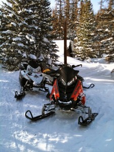 Snowmobiles after American Auto Body fixed them 